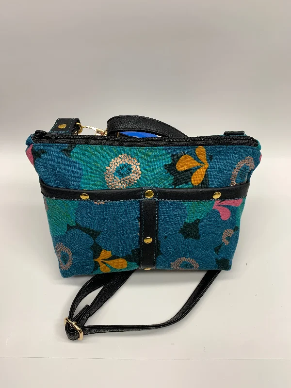 Quick Grab Deals Colorful canvas crossbody bag with adjustable strap and leather trim.