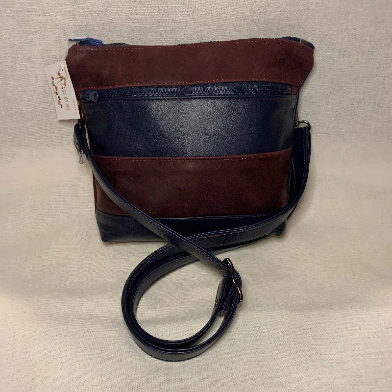 Contemporary Chic Promotions Classically designed all leather crossbody bag with burgundy and navy stripes.