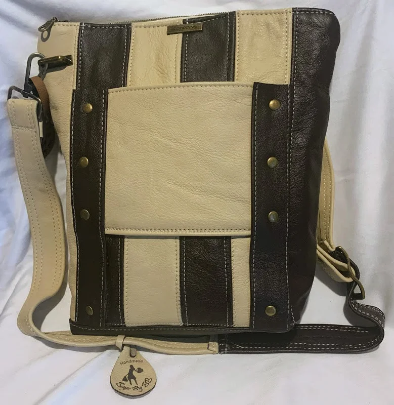 Everyday Bags For Work, School, Or Errands An all leather fully lined crossbody with both horizontal and vertical lines