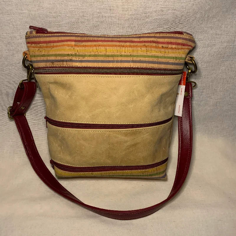 Modern Fashion Sale Mixed media crossbody bag of leather and cork with multiple exterior zipper pockets.