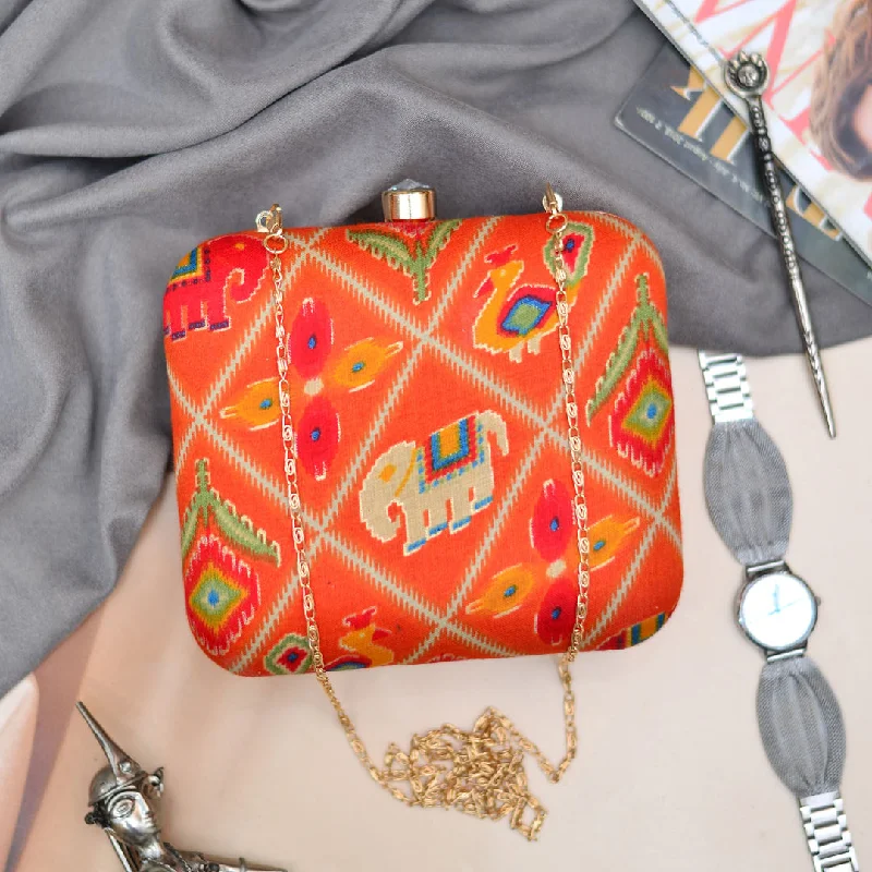 Stylish Bags For Fashion Influencers And Bloggers Orange Ethnic Fabric Clutch