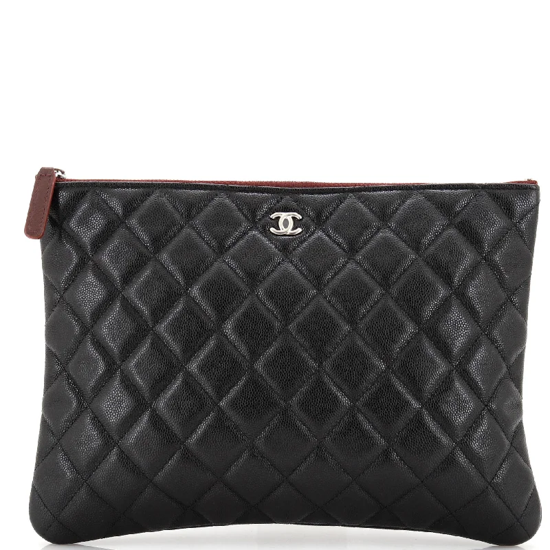 Compact Bags For Minimalist Travelers O Case Clutch Quilted Caviar Medium